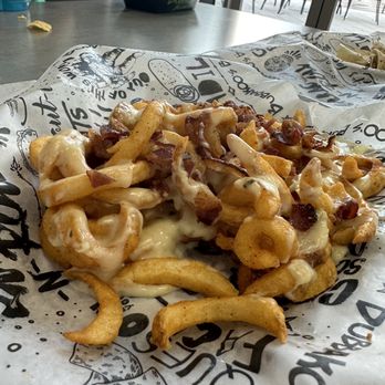 Bubbakoo's Burritos - Loaded curly fries yum! - New Mexican Cuisine Near Me - Lake Mary, Florida