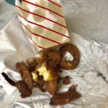 Wicked cheesy - fried onion rings and a paper bag - Pizza Near Me - Tewksbury, Massachusetts Wicked cheesy - fried onion rings and a paper bag - Pizza Near Me - Tewksbury, Massachusetts