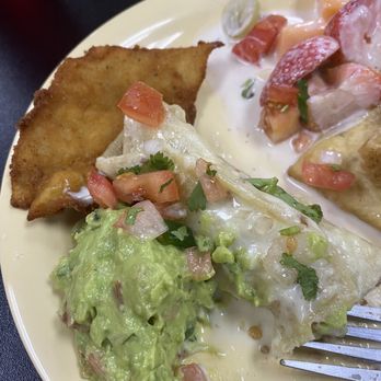 Paleteria - a plate of food with a fork - Mexican Near Me - Paducah, Kentucky Paleteria - a plate of food with a fork - Mexican Near Me - Paducah, Kentucky