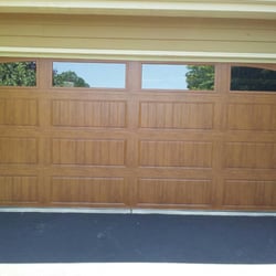 Kishwaukee Garage Doors & Service - wood finish steel door