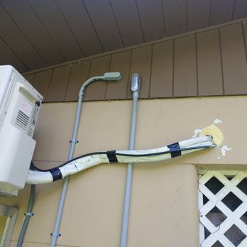 Executive Cooling and Heating - If it was through the attic, it would have looked a lot neater. No line set cover - Heating & Air Conditioning/HVAC Near Me - Punta Gorda, Florida Executive Cooling and Heating - If it was through the attic, it would have looked a lot neater. No line set cover - Heating & Air Conditioning/HVAC Near Me - Punta Gorda, Florida