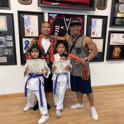 Flaherty's Kenpo Karate - My babies earn their Purple Belt