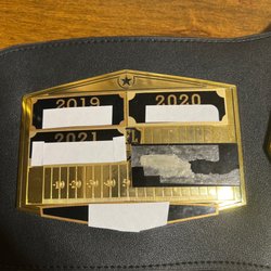 Tracy Awards & Embroidery - Double sided tape used "too secure plate" not safe at all