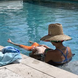 Atlantica Swim - Emily helping my boy learn to put his ears under water.