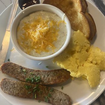 Breakfast At Barneys - Cheese grits with chicken sausage and eggs - Breakfast & Brunch Near Me - Atlanta, Georgia Breakfast At Barneys - Cheese grits with chicken sausage and eggs - Breakfast & Brunch Near Me - Atlanta, Georgia