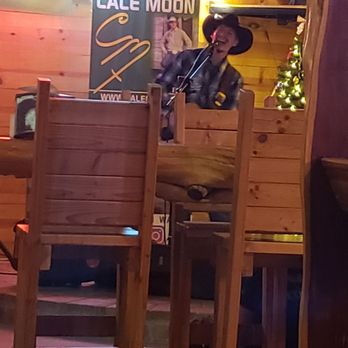 Dallys Down Under Saloon - two men sitting at a table - Pubs Near Me - Johnson City, Texas Dallys Down Under Saloon - two men sitting at a table - Pubs Near Me - Johnson City, Texas