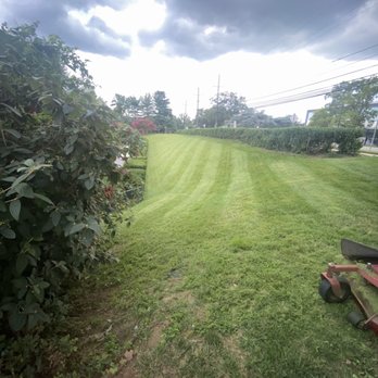 Tenango landscaping - a lawn mower cutting grass - Landscaping Near Me Tenango landscaping - a lawn mower cutting grass - Landscaping Near Me