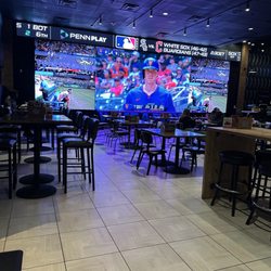 TV is HUGE! Restaurant Dining Area.