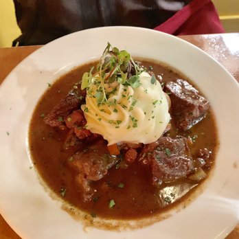 Bon Ami - Beef bourguignon in red wine and veal demi-glacé with vegetables, mushrooms, bacon, mashed potatoes topped with radish sprouts - Creperies Near Me - Denver, Colorado