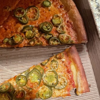 Pagliacci Pizza - Burned pizza and it's swimming in jalapeños water. - Pizza Near Me - Kirkland, Washington