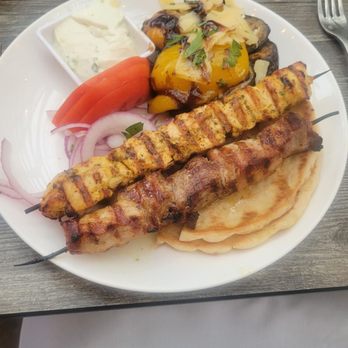 Plateia Mediterranean Kitchen Bar - Pork and Chicken Skewer with a side of Grilled Veggies - Bars Near Me - Glenview, Illinois Plateia Mediterranean Kitchen Bar - Pork and Chicken Skewer with a side of Grilled Veggies - Bars Near Me - Glenview, Illinois