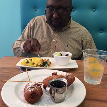 Staks Pancake Kitchen - Memphis - My man enjoying his omelette w/fruits and the deep fried pancake sausage w/syrup. - American Near Me - Memphis, Tennessee