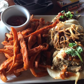 Ama Ama Restaurant - Kalua pork in steamed bao 3 ways with sweet potato fries - New American Near Me - Kapolei, Hawaii