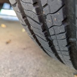 Photo showing tread wear indicator (bar). Discount Tire disingenuously told me I needed 4 new tires due to wear.