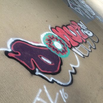 O Donut Paradise - graffiti on the ground - Donuts Near Me - Springtown, Texas