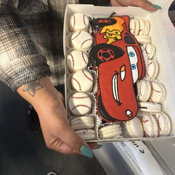 Demi's Treats - This customized macaroon is 10.5 inches. Flavors: McQueen: abuelita Baseballs: white chocolate raspberry - Macarons Near Me Demi's Treats - This customized macaroon is 10.5 inches. Flavors: McQueen: abuelita Baseballs: white chocolate raspberry - Macarons Near Me