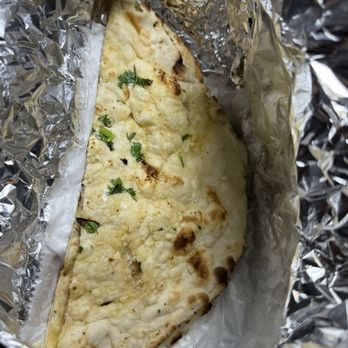 Indian & Nepali Kitchen - 77. Garlic Naan - Indian Near Me - Pataskala, Ohio Indian & Nepali Kitchen - 77. Garlic Naan - Indian Near Me - Pataskala, Ohio