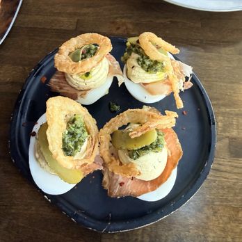 Laurelhurst Market - Deviled Eggs with Bacon, Pickle and Crispy Onion - Steakhouses Near Me - Portland, Oregon Laurelhurst Market - Deviled Eggs with Bacon, Pickle and Crispy Onion - Steakhouses Near Me - Portland, Oregon