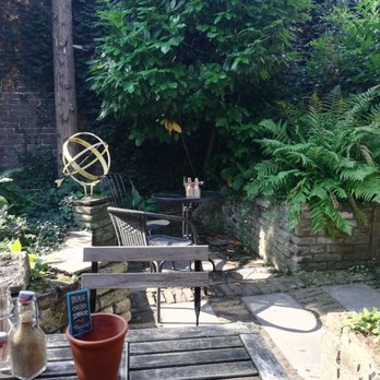 Livin' Room - Outside in their little garden - Cafes Near Me - Maastricht, LI Livin' Room - Outside in their little garden - Cafes Near Me - Maastricht, LI