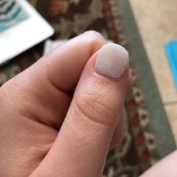 The manager did my nails.. this is 1 day post manicure and she couldn't even get the dip nicely aligned with my cuticle. Very sloppy.