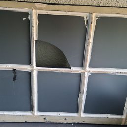 Back of broken mirrored window, which Wilson repaired quickly and reasonably. Back of broken mirrored window, which Wilson repaired quickly and reasonably.