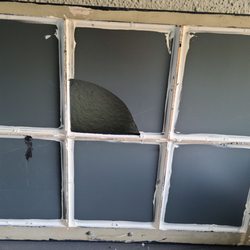 Wilson Glass - Back of broken mirrored window, which Wilson repaired quickly and reasonably.