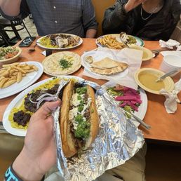 Philly Cheese Steak Sandwich, Gyro Lamb with Rice, Lentil Soup, Greek Salad, Hummus and Shawarma, Sambusak Grilled Lamb Kabob