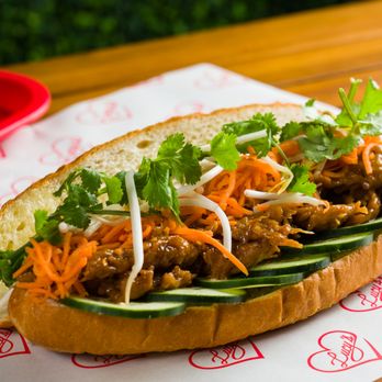 Lucys Vietnamese - a meat sandwich with cucumbers and carrots - Vietnamese Near Me - Brooklyn, New York