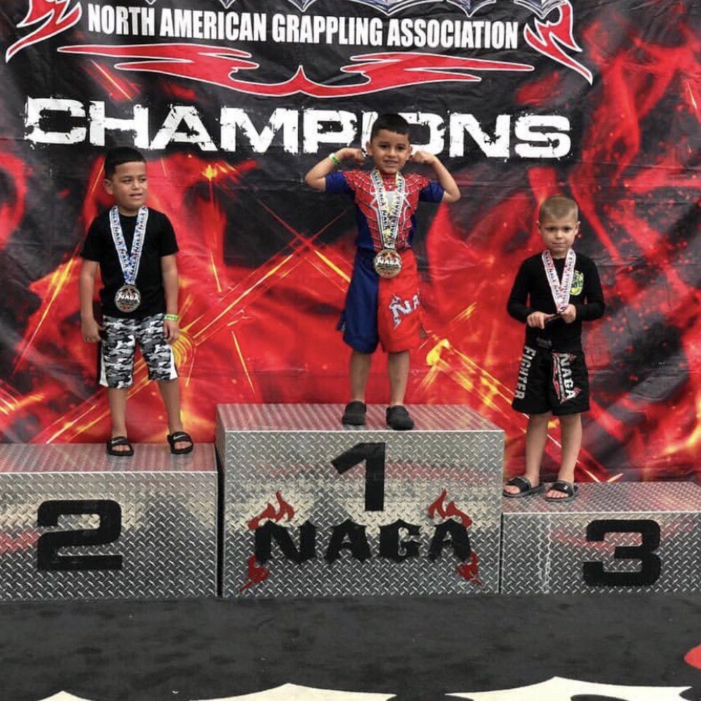 Strategic Combat Academy - First competion at 45lbs beginner No Gi 1st Place. - Martial Arts Near Me - Old Bridge, New Jersey Strategic Combat Academy - First competion at 45lbs beginner No Gi 1st Place. - Martial Arts Near Me - Old Bridge, New Jersey
