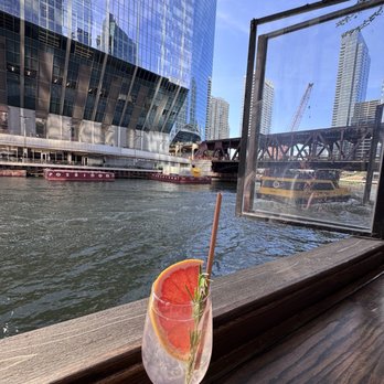 Beatnik On The River - Lovely Spanish G&T at the standing bar downstairs overlooking the river. - Cocktail Bars Near Me - Chicago, Illinois Beatnik On The River - Lovely Spanish G&T at the standing bar downstairs overlooking the river. - Cocktail Bars Near Me - Chicago, Illinois
