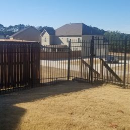 Newly installed portion of aluminum fence attached to gate. This replaced damage section done by a deer. Newly installed portion of aluminum fence attached to gate. This replaced damage section done by a deer.