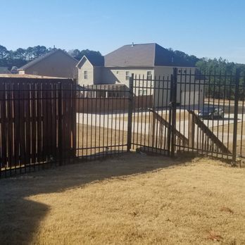 Ergeon - Newly installed portion of aluminum fence attached to gate. This replaced damage section done by a deer. - Fences & Gates Near Me - Atlanta, Georgia Ergeon - Newly installed portion of aluminum fence attached to gate. This replaced damage section done by a deer. - Fences & Gates Near Me - Atlanta, Georgia