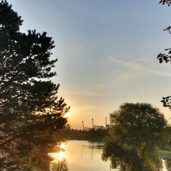Olympiapark - Sunset over the lake at Olympiapark Kanal - Amusement Parks Near Me - Munich, BY