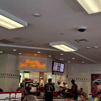 In-N-Out Burger - This is a view of the ordering counter from where seated - Burgers Near Me - Rancho Mirage, California In-N-Out Burger - This is a view of the ordering counter from where seated - Burgers Near Me - Rancho Mirage, California