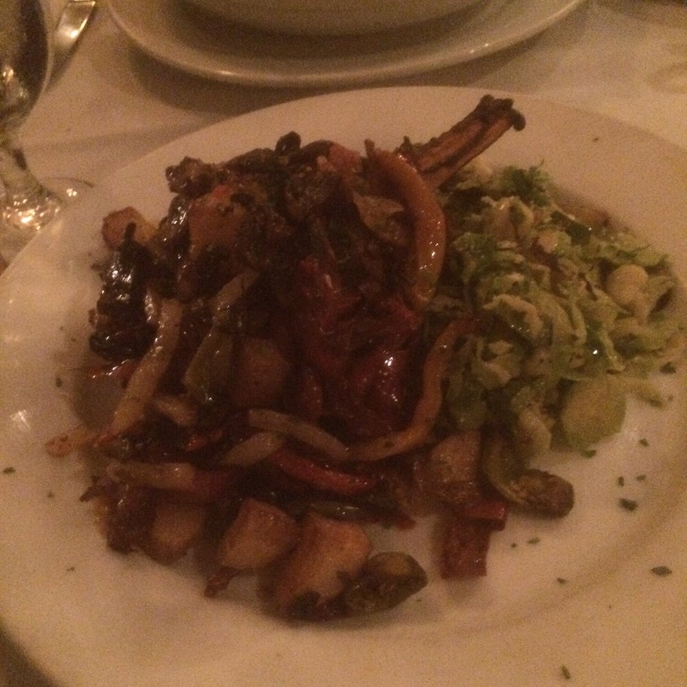 Piccolo Restaurant of Huntington - delicious fried pork chop with crisp baked potato and saluted Brussels sprout. - Italian Near Me - Huntington, New York Piccolo Restaurant of Huntington - delicious fried pork chop with crisp baked potato and saluted Brussels sprout. - Italian Near Me - Huntington, New York