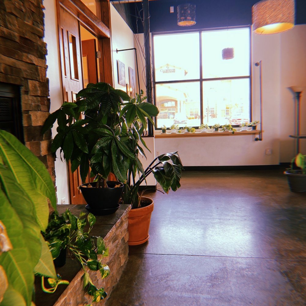 Coffea Roasterie - a view of a living room with potted plants - Bakeries Near Me - Sioux Falls, South Dakota Coffea Roasterie - a view of a living room with potted plants - Bakeries Near Me - Sioux Falls, South Dakota