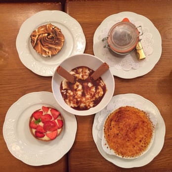 Bistrot Richelieu - Lemon tart, chocolate pudding (not sure the name) rice pudding with homemade salted caramel, creme brûlée, and strawberry tart. - French Near Me - Paris, 01 Bistrot Richelieu - Lemon tart, chocolate pudding (not sure the name) rice pudding with homemade salted caramel, creme brûlée, and strawberry tart. - French Near Me - Paris, 01