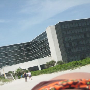 Hilton Cocoa Beach Oceanfront - View of Hilton from the beach you could see the stairs leading to the beach from hotel - Hotels Near Me - Cocoa Beach, Florida Hilton Cocoa Beach Oceanfront - View of Hilton from the beach you could see the stairs leading to the beach from hotel - Hotels Near Me - Cocoa Beach, Florida