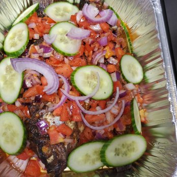Delish Dining - Grilled tilapia fish - African Near Me - Calgary, Alberta