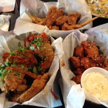 Wing Daddy's - Traditional wings with pico de gallo sauce (left), boneless wings with honey BBQ sauce and ranch dressing - Chicken Wings Near Me - San Antonio, Texas Wing Daddy's - Traditional wings with pico de gallo sauce (left), boneless wings with honey BBQ sauce and ranch dressing - Chicken Wings Near Me - San Antonio, Texas