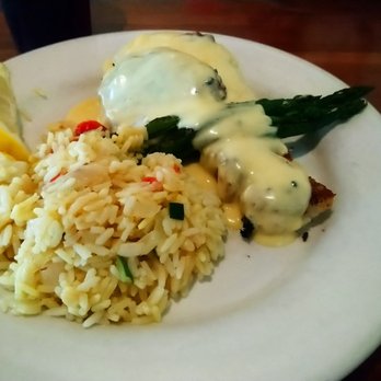 Crabapple's - Haddock Neptune: Blackened haddock topped with a crabcake and layered with hollandaise sauce. - Seafood Near Me - Falmouth, Massachusetts Crabapple's - Haddock Neptune: Blackened haddock topped with a crabcake and layered with hollandaise sauce. - Seafood Near Me - Falmouth, Massachusetts