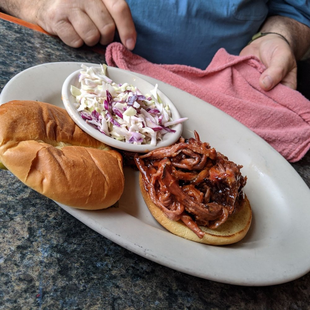 Sparky's Garage - BBQ Brisket sandwich and coleslaw - American Near Me - Dillon, Montana Sparky's Garage - BBQ Brisket sandwich and coleslaw - American Near Me - Dillon, Montana