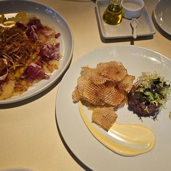 BCN Taste & Tradition - Left: egg yolk carpaccio Right: beef tartar - Catalan Near Me - Houston, Texas BCN Taste & Tradition - Left: egg yolk carpaccio Right: beef tartar - Catalan Near Me - Houston, Texas
