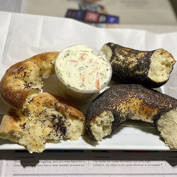 Kossar's Bagels & Bialys - Bialy and bagel ripped apart in a frenzy of voracious hunger ;) - Bagels Near Me - New York, New York Kossar's Bagels & Bialys - Bialy and bagel ripped apart in a frenzy of voracious hunger ;) - Bagels Near Me - New York, New York