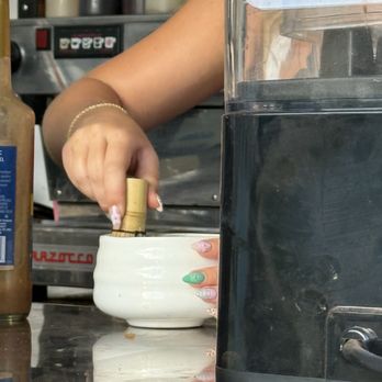 Bikini N Beanz - Whisking the matcha - Coffee & Tea Near Me - Honolulu, Hawaii