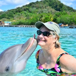 C P Trips - CIndy on a Caribbean adventure- kissed by a Dolphin!