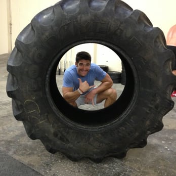 ESTLR Athletics - Matt Newhouse the owner with his new tire - Trainers Near Me - Los Angeles, California ESTLR Athletics - Matt Newhouse the owner with his new tire - Trainers Near Me - Los Angeles, California