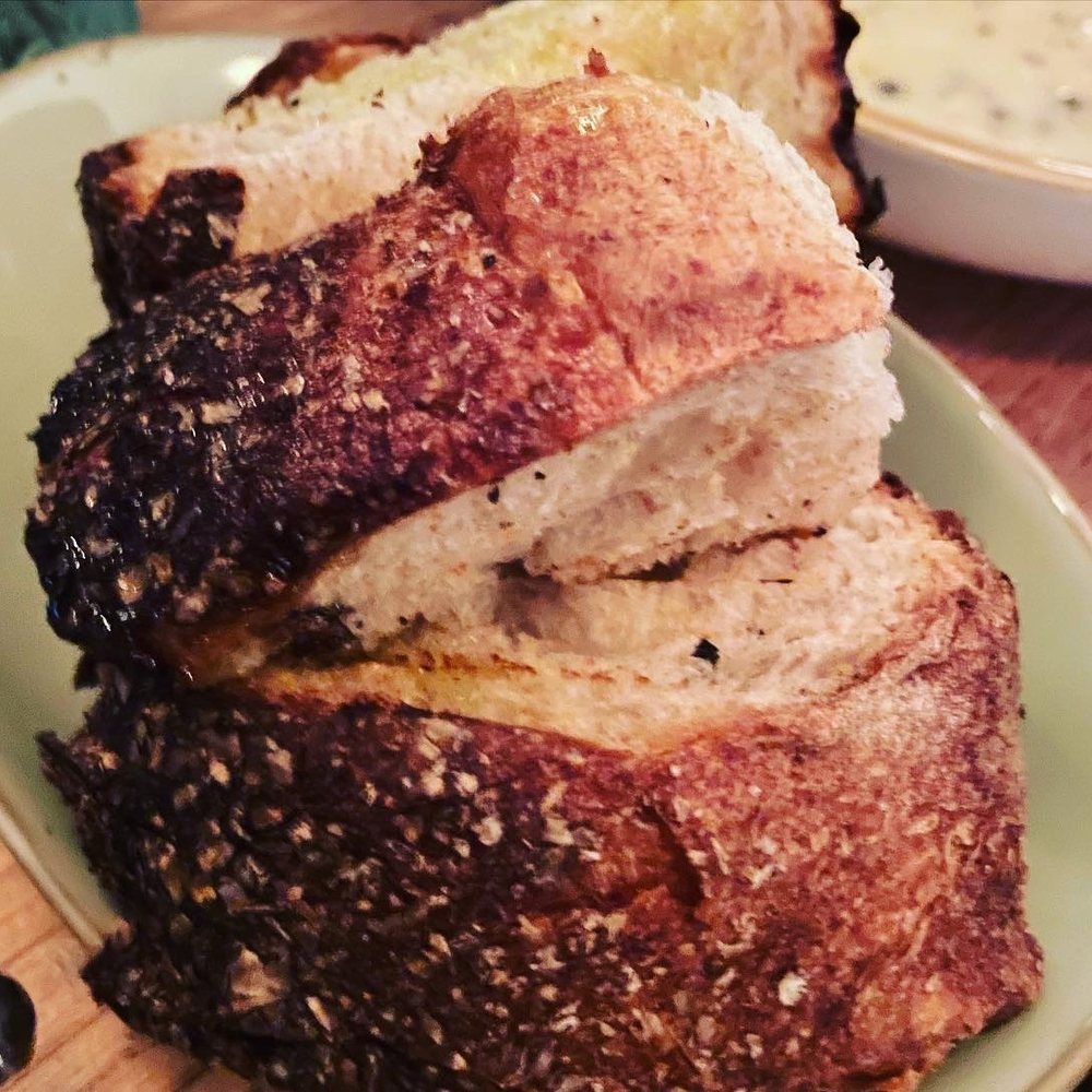 Terre - Very courteous of extra warm bread with olive oil to mop the pasta sauce - Italian Near Me - Brooklyn, New York Terre - Very courteous of extra warm bread with olive oil to mop the pasta sauce - Italian Near Me - Brooklyn, New York