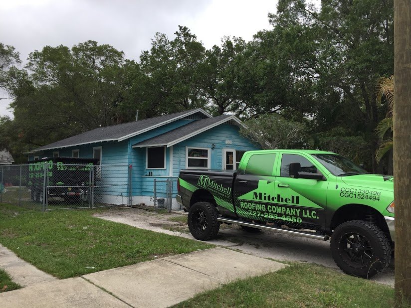 Slide of Mitchell Roofing Company