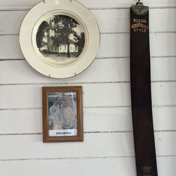Central Station - a picture of a woman in a white dress and a picture of a woman in a white dress hanging on a white wall - Bakeries Near Me - Springfield, Georgia Central Station - a picture of a woman in a white dress and a picture of a woman in a white dress hanging on a white wall - Bakeries Near Me - Springfield, Georgia